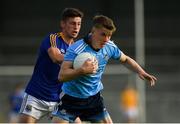 2 June 2019; Daire Newcombe of Dublin is tackled by Jordan Shiels of Longford during the EirGrid Leinster GAA Football Under 20 Championship Quarter-Final match between Longford and Dublin at Glennon Brothers Pearse Park in Longford. Photo by Eóin Noonan/Sportsfile
