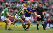 30 June 2019; Noel McGrath of Tipperary in action against Graeme Mulcahy, left, and Tom Morrissey of Limerick during the Munster GAA Hurling Senior Championship Final match between Limerick and Tipperary at LIT Gaelic Grounds in Limerick. Photo by Piaras Ó Mídheach/Sportsfile