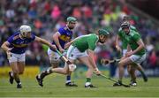 30 June 2019; William O’Donoghue of Limerick gets away Niall O'Meara, left, and Noel McGrath, of Tipperary during the Munster GAA Hurling Senior Championship Final match between Limerick and Tipperary at LIT Gaelic Grounds in Limerick. Photo by Piaras Ó Mídheach/Sportsfile