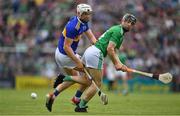 30 June 2019; Brendan Maher of Tipperary and Graeme Mulcahy of Limerick contest a loose ball during the Munster GAA Hurling Senior Championship Final match between Limerick and Tipperary at LIT Gaelic Grounds in Limerick. Photo by Brendan Moran/Sportsfile