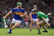30 June 2019; Noel McGrath of Tipperary in action against Graeme Mulcahy of Limerick during the Munster GAA Hurling Senior Championship Final match between Limerick and Tipperary at LIT Gaelic Grounds in Limerick. Photo by Brendan Moran/Sportsfile