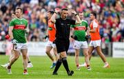 29 June 2019; Referee Maurice Deegan signals for fans to get off the pitch before the final whistle during the GAA Football All-Ireland Senior Championship Round 3 match between Mayo and Armagh at Elverys MacHale Park in Castlebar, Mayo. Photo by Brendan Moran/Sportsfile