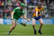 30 June 2019; Adam Murrihy of Limerick in action against Sean Ronan of Clare during the Electric Ireland Munster GAA Hurling Minor Championship Final match between Limerick and Clare at LIT Gaelic Grounds in Limerick. Photo by Brendan Moran/Sportsfile