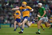 30 June 2019; Shane Meehan of Clare in action against Jimmy Quilty of Limerick during the Electric Ireland Munster GAA Hurling Minor Championship Final match between Limerick and Clare at LIT Gaelic Grounds in Limerick. Photo by Brendan Moran/Sportsfile