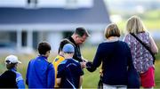 3 July 2019; Wexford hurling manager Davy Fitzgerald signing autographs during the Pro-Am round ahead of the Dubai Duty Free Irish Open at Lahinch Golf Club in Lahinch, Co. Clare. Photo by Ramsey Cardy/Sportsfile