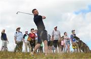 3 July 2019; Former Kerry footballer Tomas Ó Sé watches his shot on the 4th tee during the Pro-Am round ahead of the Dubai Duty Free Irish Open at Lahinch Golf Club in Lahinch, Co. Clare. Photo by Ramsey Cardy/Sportsfile