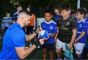 3 July 2019; Leinster player Josh Murphy with participants during the Bank of Ireland Leinster Rugby Summer Camp at Terenure RFC in Terenure, Dublin. Photo by Harry Murphy/Sportsfile