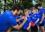 3 July 2019; Leinster player Caelan Doris with participants during the Bank of Ireland Leinster Rugby Summer Camp at Terenure RFC in Terenure, Dublin. Photo by Harry Murphy/Sportsfile