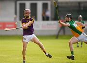 3 July 2019; Ross Banville of Wexford in action against Conor Butler of Offaly during the Bord Gais Energy Leinster GAA Hurling U20 Championship Semi-Final match between Offaly and Wexford at Bord na Mona O'Connor Park in Tullamore, Offaly. Photo by Sam Barnes/Sportsfile