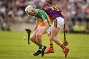 3 July 2019; Dara Maher of Offaly in action against Seán O'Connor of Wexford during the Bord Gais Energy Leinster GAA Hurling U20 Championship Semi-Final match between Offaly and Wexford at Bord na Mona O'Connor Park in Tullamore, Offaly. Photo by Sam Barnes/Sportsfile
