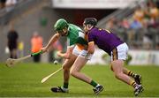 3 July 2019; Brian Duignan of Offaly in action against Conor Scallan of Wexford during the Bord Gais Energy Leinster GAA Hurling U20 Championship Semi-Final match between Offaly and Wexford at Bord na Mona O'Connor Park in Tullamore, Offaly. Photo by Sam Barnes/Sportsfile