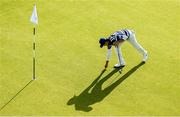 4 July 2019; Jack Singh Brar of England repairs a pitch mark on the 5th green during day one of the 2019 Dubai Duty Free Irish Open at Lahinch Golf Club in Lahinch, Clare. Photo by Ramsey Cardy/Sportsfile