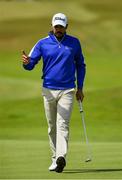 4 July 2019; Gaganjeet Bhullar of India acknowledges the gallery after putting on the 17th green during day one of the 2019 Dubai Duty Free Irish Open at Lahinch Golf Club in Lahinch, Clare. Photo by Brendan Moran/Sportsfile