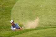 4 July 2019; Padraig Harrington of Ireland plays out of the bunker on the 18th hole during day one of the 2019 Dubai Duty Free Irish Open at Lahinch Golf Club in Lahinch, Clare. Photo by Ramsey Cardy/Sportsfile