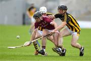 4 July 2019; Mark Kennedy of Galway in action against Michael Carey and Mikey Butler of Kilkenny during the Bord Gais Energy Leinster GAA Hurling U20 Championship semi-final match between Galway and Kilkenny at Bord na Mona O'Connor Park in Tullamore, Offaly. Photo by Matt Browne/Sportsfile