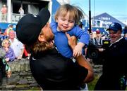 5 July 2019; Tommy Fleetwood of England greets his son Franklin after finishing his round during day two of the 2019 Dubai Duty Free Irish Open at Lahinch Golf Club in Lahinch, Clare. Photo by Brendan Moran/Sportsfile