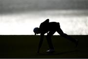 5 July 2019; Benjamin Hebert of France picks his ball out of the 7th hole during day two of the 2019 Dubai Duty Free Irish Open at Lahinch Golf Club in Lahinch, Clare. Photo by Ramsey Cardy/Sportsfile