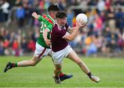 5 July 2019; Warren Seoige of Galway in action against John Grady of Mayo during the Electric Ireland Connacht GAA Football Minor Championship Final match between Galway and Mayo at Tuam Stadium in Tuam, Galway. Photo by Matt Browne/Sportsfile