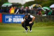 6 July 2019; Shane Lowry of Ireland lines up a putt on the 18th green during day three of the 2019 Dubai Duty Free Irish Open at Lahinch Golf Club in Lahinch, Clare. Photo by Ramsey Cardy/Sportsfile