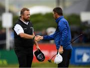 6 July 2019; Shane Lowry of Ireland, left, shakes hands with Liam Johnston of Scotland after his round during day three of the 2019 Dubai Duty Free Irish Open at Lahinch Golf Club in Lahinch, Clare. Photo by Ramsey Cardy/Sportsfile