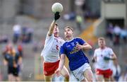 6 July 2019; Aidan Clarke of Tyrone in action against Cormac O'Reilly of Cavan during the EirGrid Ulster GAA Football U20 Championship semi-final match between Cavan and Tyrone at St. Tiernach's Park in Clones, Monaghan. Photo by Ben McShane/Sportsfile