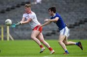 6 July 2019; Joe Ogus of Tyrone in action against Philip Nulty of Cavan during the EirGrid Ulster GAA Football U20 Championship semi-final match between Cavan and Tyrone at St. Tiernach's Park in Clones, Monaghan. Photo by Oliver McVeigh/Sportsfile