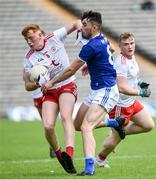6 July 2019; Ruairi Gormleyof Tyrone in action against Ronan Patterson of Cavan during the EirGrid Ulster GAA Football U20 Championship semi-final match between Cavan and Tyrone at St. Tiernach's Park in Clones, Monaghan. Photo by Oliver McVeigh/Sportsfile