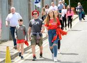 6 July 2019; Fans make their way to the stadium prior to the GAA Football All-Ireland Senior Championship Round 4 match between Cavan and Tyrone at St. Tiernach's Park in Clones, Monaghan. Photo by Oliver McVeigh/Sportsfile