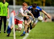6 July 2019; James Garrity of Tyrone in action against Michael Muldoon of Cavan during the EirGrid Ulster GAA Football U20 Championship semi-final match between Cavan and Tyrone at St. Tiernach's Park in Clones, Monaghan. Photo by Oliver McVeigh/Sportsfile