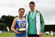 6 July 2019; Ava O'Connor of Tullamore Harriers A.C., Co.Offaly,  and Louis O'Loughlin of Donore Harriers, Co. Dublin after winning the Junior Women 1500m and Junior Men 800m respectively, during the Irish Life Health Junior and U23 Outdoor Track and Field Championships at Tullamore Harriers Stadium, Tullamore in Offaly. Photo by Sam Barnes/Sportsfile