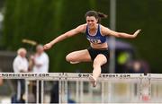 6 July 2019; Alison Burke of Dublin City Harriers A.C., Co. Dublin, on her way to winning the Junior Women's 100m Hurdles during the Irish Life Health Junior and U23 Outdoor Track and Field Championships at Tullamore Harriers Stadium, Tullamore in Offaly. Photo by Sam Barnes/Sportsfile