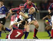 31 November 2003; Neil Jenkins, Celtic Warriors, is tackled by Munster's Colm McMahon,7, and Mike Mullins. Celtic League Tournament, Munster v Celtic Warriors, Thomond Park, Limerick. Picture credit; Matt Browne / SPORTSFILE *EDI*