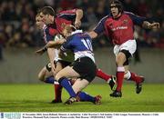 31 November 2003; Jason Holland, Munster, is tackled by  Celtic Warriors's Neil Jenkins. Celtic League Tournament, Munster v Celtic Warriors, Thomond Park, Limerick. Picture credit; Matt Browne / SPORTSFILE *EDI*