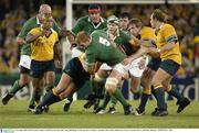 1 November 2003; Paul O'connell, Ireland, is tackled by Australia's Bill Young. 2003 Rugby World Cup, Pool A, Ireland v Australia, Telstra Dome, Melbourne, Victoria, Australia. Picture credit; Ray McManus / SPORTSFILE *EDI*