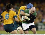 1 November 2003; Keith Wood, Ireland, is tackled by Australia's Natham Sharpe and George Smith, (6). 2003 Rugby World Cup, Pool A, Ireland v Australia, Telstra Dome, Melbourne, Victoria, Australia. Picture credit; Ray McManus / SPORTSFILE *EDI*