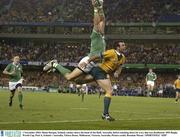 1 November 2003; Shane Horgan, Ireland, catches above the head of Joe Roff, Australia, before touching down for a try that was disallowed. 2003 Rugby World Cup, Pool A, Ireland v Australia, Telstra Dome, Melbourne, Victoria, Australia. Picture credit; Brendan Moran / SPORTSFILE *EDI*