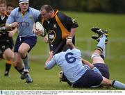1 November 2003; Martin Cahill, Buccaneers, is tackled by UCD's Neil Coughlan, 6. AIB League Division 1, UCD v Buccaneers, Belfield, UCD, Dublin. Rugby. Picture credit; Matt Browne / SPORTSFILE *EDI*