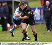 1 November 2003; Paddy O'Sullivan, Buccaneers, is tackled by UCD's Gareth Hays. AIB League Division 1, UCD v Buccaneers, Belfield, UCD, Dublin. Rugby. Picture credit; Matt Browne / SPORTSFILE *EDI*