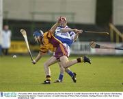 2 November 2003; James Hooban, Castletown, has his shot blocked by Craobh Chiarain's David Wyse. AIB Leinster Club Hurling Championship Quarter- Final, Castletown v Craobh Chiarain, O'Moore Park, Portlaoise. Hurling. Picture credit; Matt Browne / SPORTSFILE *EDI*