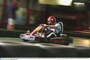 3 November 2003; Ireland prop Marcus Horan in action on an indoor karting track during a team rest day. 2003 Rugby World Cup, Ireland players rest day, Auscart Indoor Karting centre, Melbourne, Victoria, Australia. Picture credit; Brendan Moran / SPORTSFILE *EDI*