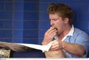 5 November 2003; Ireland wing Anthony Horgan enjoys an apple and a read of a local newspaper after squad training. 2003 Rugby World Cup, Irish squad training, Whitton Oval, Melbourne, Victoria, Australia. Picture credit; Brendan Moran / SPORTSFILE *EDI*