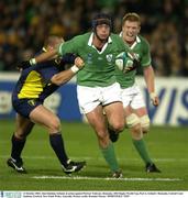 11 October 2003; Alan Quinlan, Ireland, in action against Petrisor Toderasc, Romania. 2003 Rugby World Cup, Pool A, Ireland v Romania, Central Coast Stadium, Gosford, New South Wales, Australia. Picture credit; Brendan Moran / SPORTSFILE *EDI*