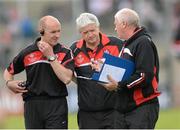 2 June 2013; Derry manager Brian McIver, centre, with trainer Paddy Tall, left, and selector Bernie Henry. Ulster GAA Football Senior Championship, Quarter-Final, Derry v Down, Celtic Park, Derry. Picture credit: Oliver McVeigh / SPORTSFILE