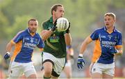 15 June 2013; Graham Reilly, Meath, in action against Dean Healy, right, and Darragh O'Sullivan, Wicklow. Leinster GAA Football Senior Championship Quarter-Final, Wicklow v Meath, County Grounds, Aughrim, Co. Wicklow. Picture credit: Matt Browne / SPORTSFILE