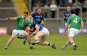 16 June 2013; Niall McDermott, Cavan, in action against Eoin Donnelly and Damian Kelly, right, Fermanagh. Ulster GAA Football Senior Championship Quarter-Final, Cavan v Fermanagh, Brewster Park, Enniskillen, Co. Fermanagh. Picture credit: Oliver McVeigh / SPORTSFILE