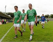 16 June 2013; A dejected Shane McCabe, Sean Quigley and Daniel Kille, Fermanagh leave the field after the game. Ulster GAA Football Senior Championship Quarter-Final, Cavan v Fermanagh, Brewster Park, Enniskillen, Co. Fermanagh. Picture credit: Oliver McVeigh / SPORTSFILE