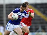 6 July 2019; John O'Loughlin of Laois in action against Ian Maguire of Cork during the GAA Football All-Ireland Senior Championship Round 4 match between Cork and Laois at Semple Stadium in Thurles, Tipperary. Photo by Matt Browne/Sportsfile