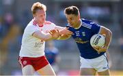 6 July 2019; Conor Madden of Cavan in action against Hugh Pat McGeary of Tyrone during the GAA Football All-Ireland Senior Championship Round 4 match between Cavan and Tyrone at St. Tiernach's Park in Clones, Monaghan. Photo by Ben McShane/Sportsfile