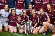 6 July 2019; Barbara Hannon of Galway and her son Miko celebrate with her team-mates and the cup after the 2019 TG4 Connacht Ladies Senior Football Final replay between Galway and Mayo at the LIT Gaelic Grounds in Limerick. Photo by Brendan Moran/Sportsfile
