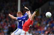 6 July 2019; Colm Murphy of Laois in action against Kevin O'Donovan of Cork during the GAA Football All-Ireland Senior Championship Round 4 match between Cork and Laois at Semple Stadium in Thurles, Tipperary. Photo by Matt Browne/Sportsfile